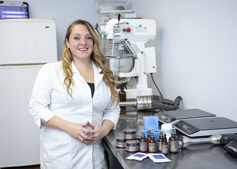 Eliza Desmarais, owner of Sohma Naturals, showcases products in her lab